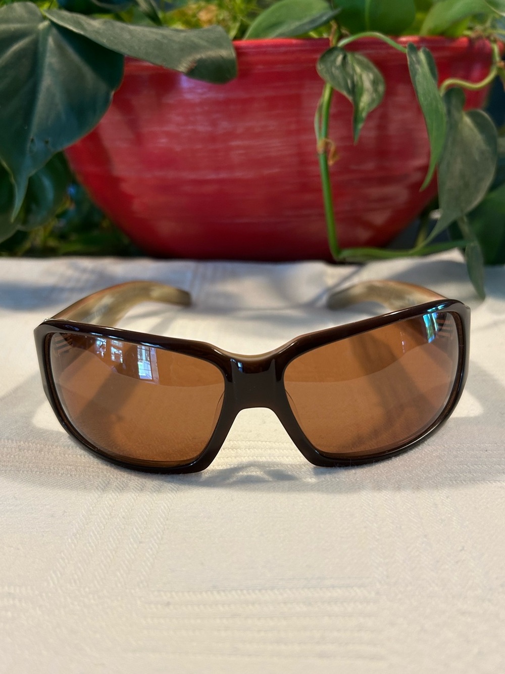 NIKE Supreme Court Tortoiselike Brown Sunglass Temple with Amber Hues